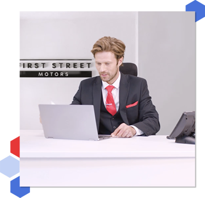 Build Consumer Trust A sales manager sat at a desk working on a laptop