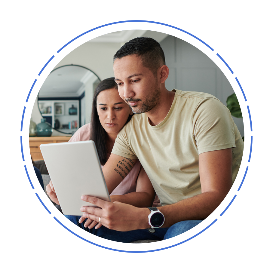 A couple looking at a tablet